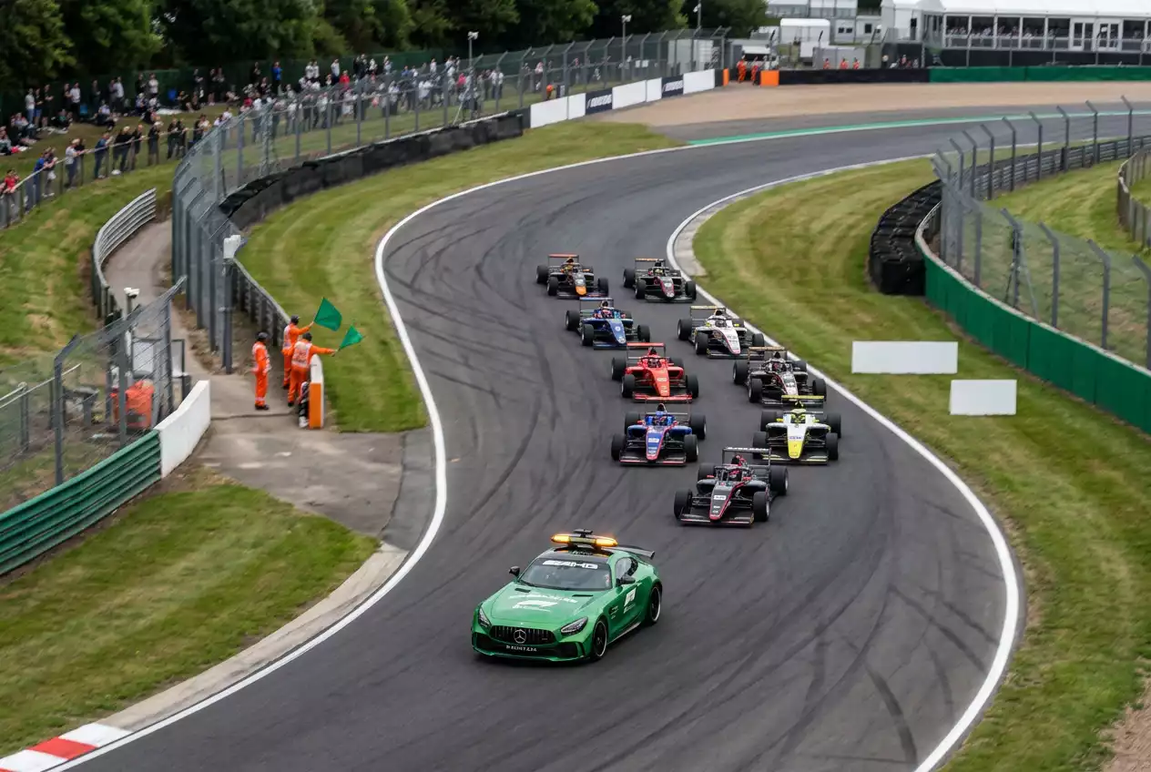 Formula 1 safety car leading the field during a race neutralisation with betting odds overlay